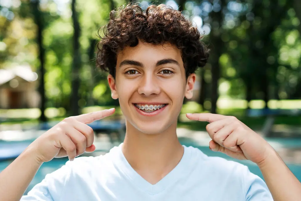 Smiling boy posing for camera with smile